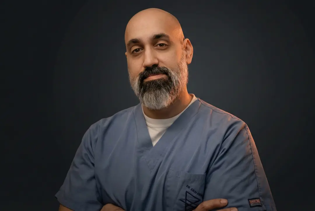 Dr. Z in medical scrubs
